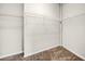 This walk-in closet features built-in shelving for organized storage at 15810 Starling Water Dr, Lithia, FL 33547