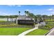 Community entrance sign with lush landscaping, showcasing a welcoming entrance for River Landing at 1724 Longliner Loop, Wesley Chapel, FL 33543