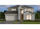 Beautiful two-story home with a brick and stone exterior and a two-car garage at 1724 Longliner Loop, Wesley Chapel, FL 33543