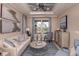 Inviting living room with stylish decor, recessed ceiling and fan, perfect for relaxation and entertaining at 1724 Longliner Loop, Wesley Chapel, FL 33543