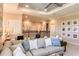 Inviting loft with comfortable seating, neutral colors, and stylish design, creating a versatile space at 1724 Longliner Loop, Wesley Chapel, FL 33543
