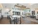 Spacious clubhouse with high-top seating, lounge area, and large windows at 1738 Longliner Loop, Wesley Chapel, FL 33543