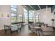 Bright lounge area with foosball table, comfortable seating, and modern decor at 1738 Longliner Loop, Wesley Chapel, FL 33543