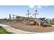 Community playground with pirate ship climbing structure in a park-like setting at 1738 Longliner Loop, Wesley Chapel, FL 33543