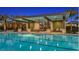 Community pool featuring a covered patio with tables and chairs and clear blue water at 1738 Longliner Loop, Wesley Chapel, FL 33543