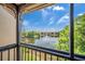 The screened-in patio showcases tranquil views of the lake and fountain at 2400 Feather Sound Dr # 1136, Clearwater, FL 33762