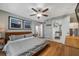 This is a bedroom with wood-look floors and a ceiling fan and neutral walls at 2400 Feather Sound Dr # 1136, Clearwater, FL 33762