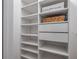 Custom closet featuring built-in shelving and storage for optimal organization at 2400 Feather Sound Dr # 1136, Clearwater, FL 33762