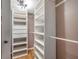 This is a closet with shelving and some drawers at 2400 Feather Sound Dr # 1136, Clearwater, FL 33762