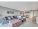 Spacious living room with decorative pillows, a comfortable couch, and a dining area at 2400 Feather Sound Dr # 1136, Clearwater, FL 33762