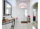 Bright foyer with tile flooring, console table, and elegant decor, setting a welcoming tone at 24305 Denali Ct, Lutz, FL 33559