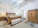 The main bedroom is spacious and includes a ceiling fan and ensuite bathroom at 24305 Denali Ct, Lutz, FL 33559