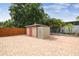 The backyard offers a brick patio and tool shed at 2701 W Osborne Ave, Tampa, FL 33614
