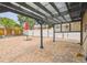 Backyard featuring a covered patio with a pergola, brick pavers, and fenced areas at 2701 W Osborne Ave, Tampa, FL 33614