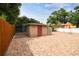 The backyard offers a brick patio and tool shed at 2701 W Osborne Ave, Tampa, FL 33614