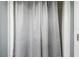 Neutral bathroom with white shower curtain at 2701 W Osborne Ave, Tampa, FL 33614