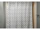 Bathroom featuring decorative shower curtain at 2701 W Osborne Ave, Tampa, FL 33614