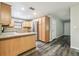 Kitchen with stainless appliances, island and wood cabinets at 2701 W Osborne Ave, Tampa, FL 33614