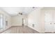 Bright living room featuring new floors and modern ceiling fan at 2906 E Columbus Dr, Tampa, FL 33605