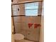 Beautifully tiled shower with glass door and modern fixtures at 2910 Star Apple Ct, Palm Harbor, FL 34684