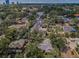 An aerial shot of the community with mature trees, manicured lawns, and a variety of architectural styles at 3416 W Morrison Ave, Tampa, FL 33629