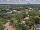 Residential neighborhood featuring lush tree coverage and a view of the city skyline at 3416 W Morrison Ave, Tampa, FL 33629