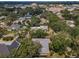 This aerial view showcases the property's location amidst lush greenery and neighborhood charm at 3416 W Morrison Ave, Tampa, FL 33629