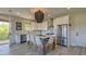 Elegant kitchen with stainless steel appliances, granite countertops and an island with seating at 344 Bay St, Palm Harbor, FL 34683