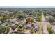 Spacious residential neighborhood aerial view with mature trees, homes, and nearby streets in the distance at 3535 16Th N St, St Petersburg, FL 33704