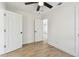 Bedroom boasting wood-look flooring, fresh white walls, and ceiling fan at 3535 16Th N St, St Petersburg, FL 33704