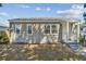 Charming single-story home featuring a cozy front porch and well-maintained landscaping at 3535 16Th N St, St Petersburg, FL 33704