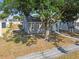 Adorable one-story home with tidy landscaping and mature trees, enhancing curb appeal at 3535 16Th N St, St Petersburg, FL 33704