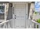 Inviting front door entrance featuring black house numbers and a white door with matching railings at 3535 16Th N St, St Petersburg, FL 33704