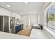 Modern kitchen featuring stainless appliances, white cabinets, and subway tile backsplash at 3535 16Th N St, St Petersburg, FL 33704