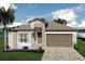 Inviting single-story home featuring neutral tones, and well-maintained landscaping at 3546 Malta Ave, Wesley Chapel, FL 33543