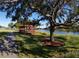 Scenic view of the gazebo on the lakefront, a tranquil spot for relaxation at 3621 102Nd N Pl, Clearwater, FL 33762