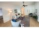 Bright open living room featuring vaulted ceilings, modern decor, and seamless flow to the bedrooms at 3621 102Nd N Pl, Clearwater, FL 33762
