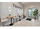 Inviting café interior with modern lighting, comfortable seating, and convenient amenities at 4165 San Severo Rd, Wesley Chapel, FL 33543