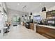 Modern café area with contemporary lighting, sleek countertops, and a variety of refreshments at 4165 San Severo Rd, Wesley Chapel, FL 33543