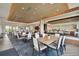 Well-appointed clubhouse dining area with stylish furniture and elegant design elements at 4165 San Severo Rd, Wesley Chapel, FL 33543