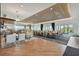 Open-concept clubhouse with lounge and dining areas, perfect for social gatherings at 4165 San Severo Rd, Wesley Chapel, FL 33543