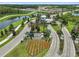 Aerial view of the Esplanade at Wiregrass Ranch entrance, showcasing lush landscaping and water features at 4165 San Severo Rd, Wesley Chapel, FL 33543