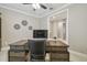 Well-appointed home office featuring a modern desk and a comfortable chair at 4165 San Severo Rd, Wesley Chapel, FL 33543