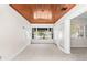 Sun-filled bonus room featuring a unique wood ceiling, large windows, and natural light at 417 Broadway, Dunedin, FL 34698