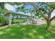 A backyard featuring a beautiful patio and trees at 4500 Great Lake S Dr, Clearwater, FL 33762