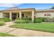 Welcoming entrance to the building, featuring manicured landscaping and a covered entryway at 4500 Great Lake S Dr, Clearwater, FL 33762