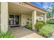 Welcoming entrance to the building, featuring lush landscaping at 4500 Great Lake S Dr, Clearwater, FL 33762