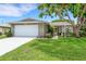 Charming single-story home with well-maintained lawn and landscaping at 4500 Great Lake S Dr, Clearwater, FL 33762