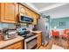 Well-equipped kitchen boasts stainless steel appliances, modern fixtures, and ample counter space at 4500 Great Lake S Dr, Clearwater, FL 33762
