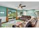 Comfortable living room with plush sofas, stylish decor, and ample natural light at 4500 Great Lake S Dr, Clearwater, FL 33762